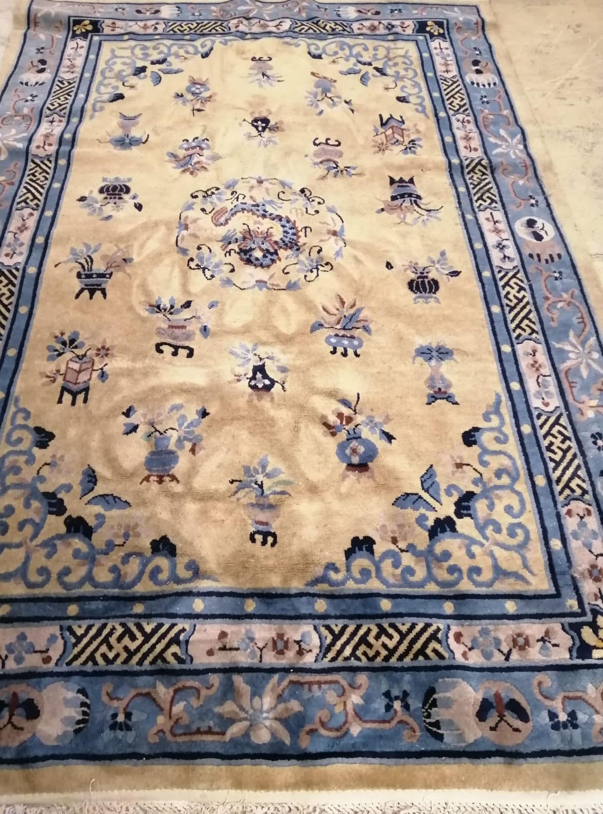A Chinese yellow ground carpet, 270 x 180cm